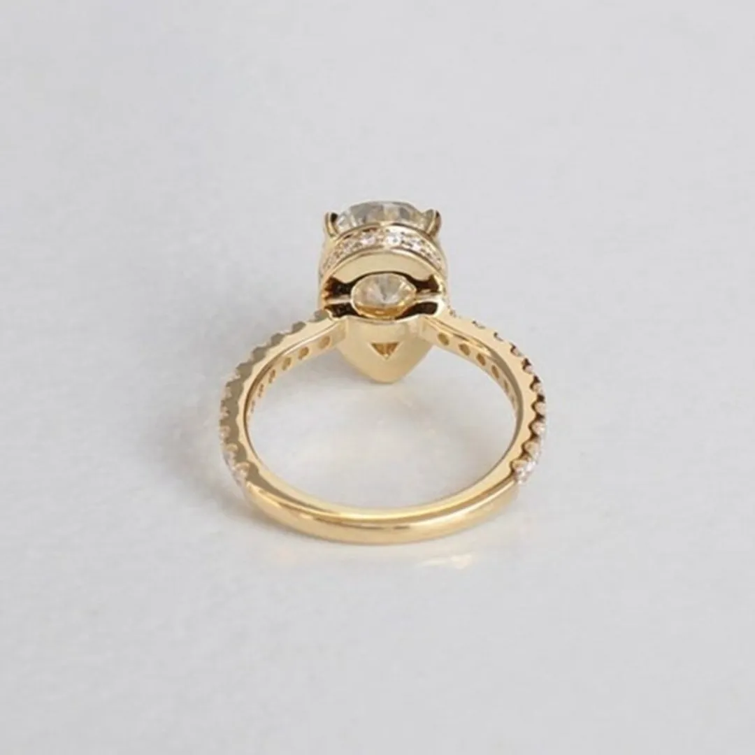 /public/photos/live/Pear Moissanite Hidden Halo Classic Engagement Ring 865 (1).webp